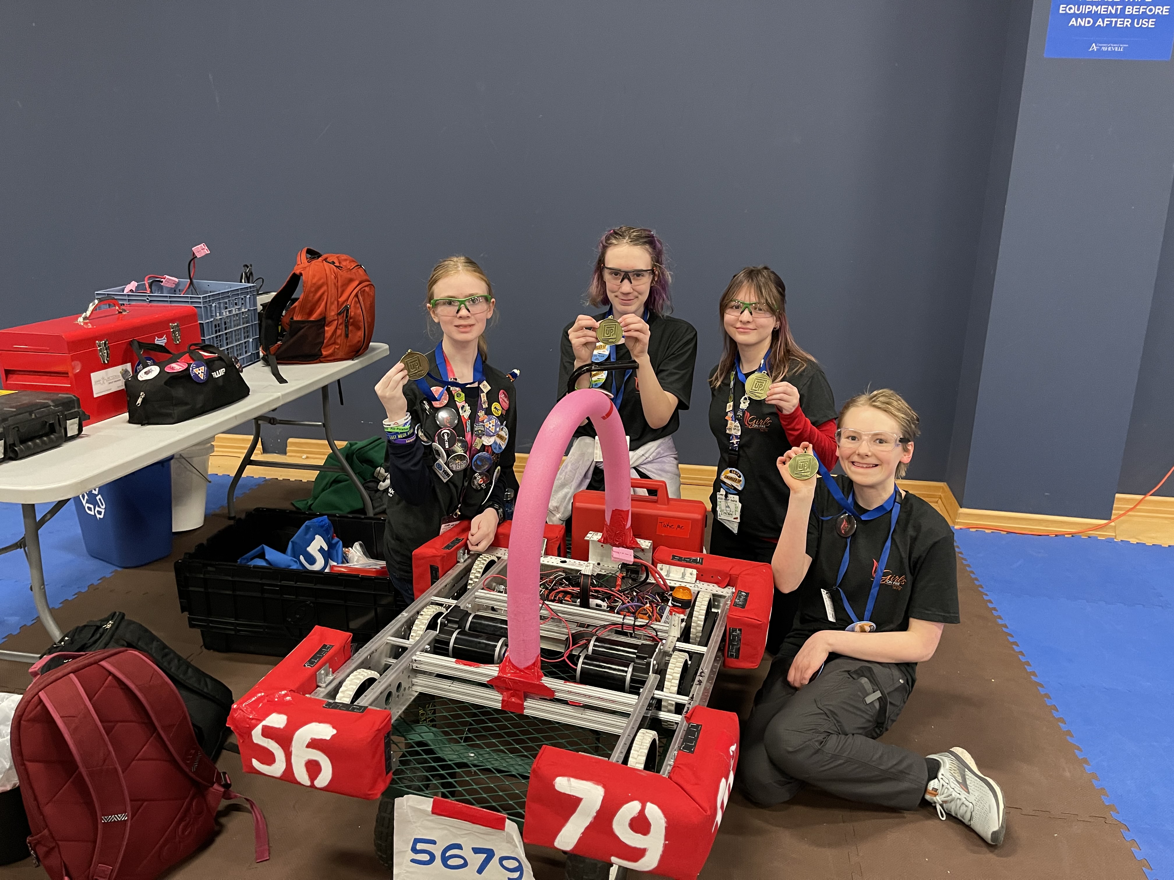 Photo of the Girls on Fire team with their robot in 2023